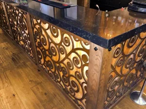 CNC decor on a bar front
