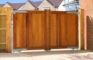 Driveway gates hung on wooden posts