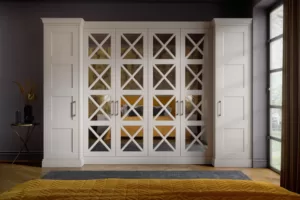 White fitted wardrobes with mirror inlay