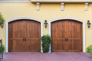 Two hardwood garage door entrances